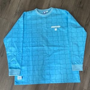 Undefeated men’s rash guard